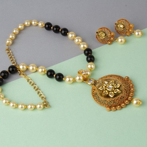 Arihant Black GP Kundan studded Pearl Necklace Set...