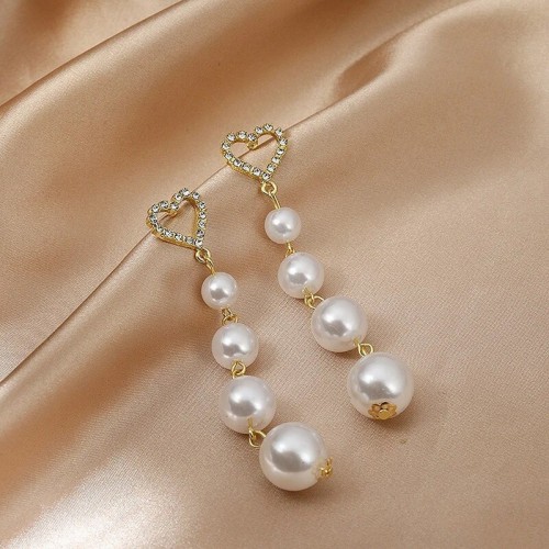 Arihant Gold Plated Korean AD and Pearl Heart them...
