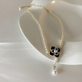 Arihant Gold Plated Pearls studded Black Floral Contemporary Necklace