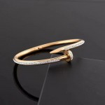 Arihant Gold Plated Stainless Steel Anti Tarnish AD Studded Nail Bracelet