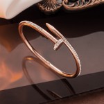 Arihant Rose Gold Plated Stainless Steel Anti Tarnish AD Studded Nail Bracelet