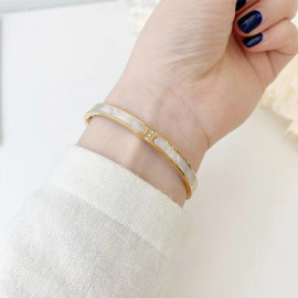 Arihant Stainless Steel Gold Plated Mother Of Pearls Contemporary Bracelet
