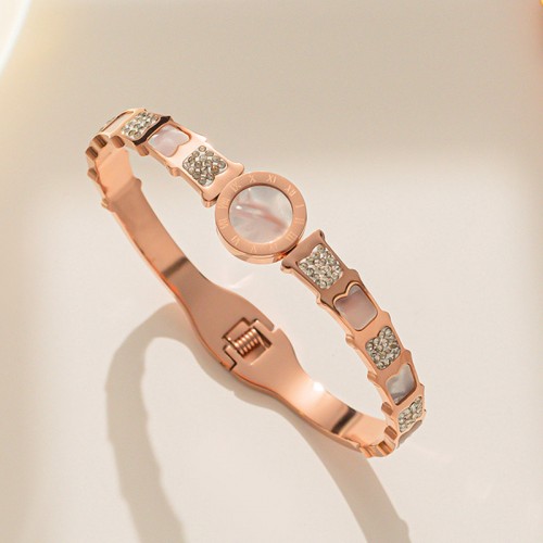 Arihant Stainless Steel Rose Gold Plated Mother Of Pearl Roman Numerals AD Studded Bracelet