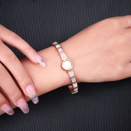 Arihant Stainless Steel Rose Gold Plated Mother Of Pearl Roman Numerals AD Studded Bracelet