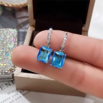 Arihant Silver Plated Blue Rectangular American Diamond Studded Crushed Ice Cut Drop Earrings