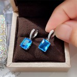 Arihant Silver Plated Blue Rectangular American Diamond Studded Crushed Ice Cut Drop Earrings
