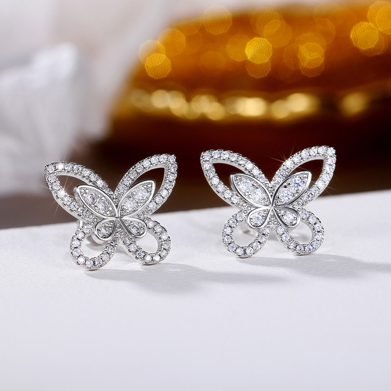 Arihant Silver Plated American Diamond Studded Butterfly Shaped Korean Earrings