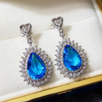Arihant Silver Plated American Diamond Studded Blue Teardop Shape Ice Cut Drop Earrings
