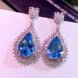 Arihant Silver Plated American Diamond Studded Blue Teardop Shape Ice Cut Drop Earrings