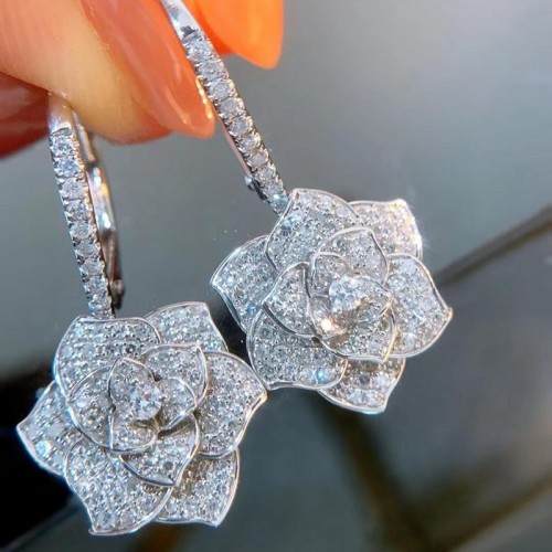 Arihant Silver Plated American Diamond Studded Floral Rose themed Drop Earrings