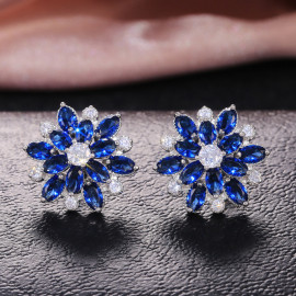Arihant Silver Plated American Diamond Studded Floral Blue Stud Earrings