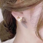 Arihant Gold Plated American Diamond Studded Bow-Tie Shape Korean Stud Earrings