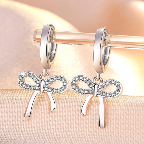 Arihant Silver Plated American Diamond Studded Bow-Tie Shape Korean Stud Earrings