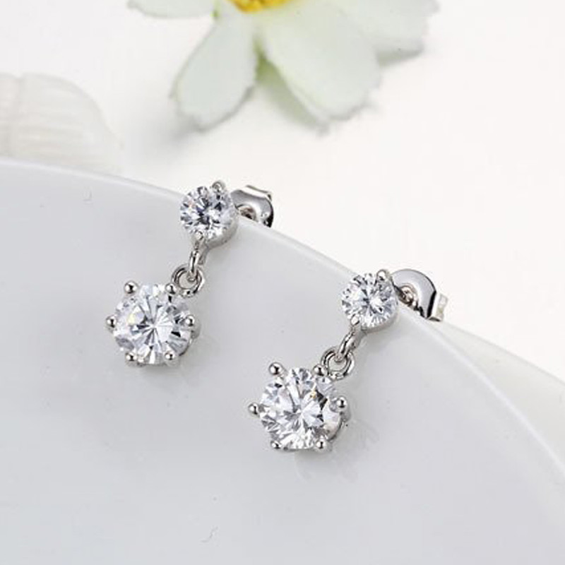 Arihant Silver Plated American Diamond Studded Hexagon Shape Korean Drop Earrings