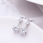 Arihant Silver Plated American Diamond Studded Hexagon Shape Korean Drop Earrings