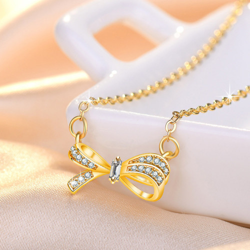 Arihant Gold Plated American Diamond Studded Bow Like Contemporary Korean Pendant