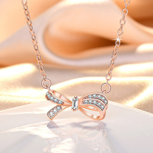 Arihant Rose Gold Plated American Diamond Studded Bow Like Contemporary Korean Pendant